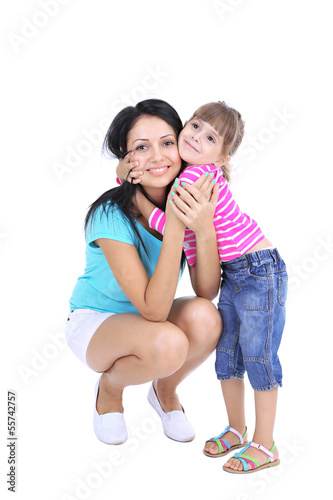 Photo: Mom and daughter together isolated on white Mom and daughter together isolated on white
