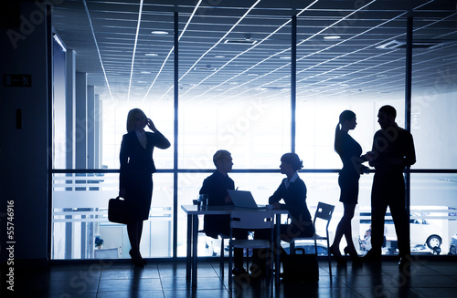 Photo: silhouettes of businesspeople silhouettes of businesspeople