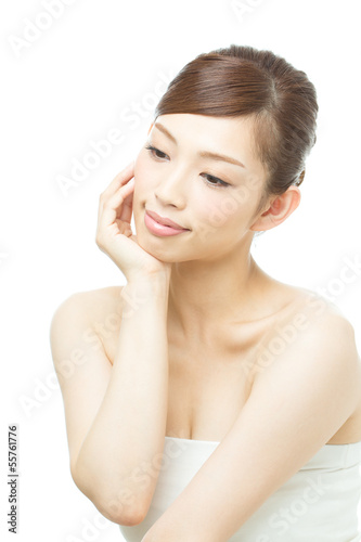 Photo: Beautiful asian woman isolated on white background Beautiful asian woman isolated on white background