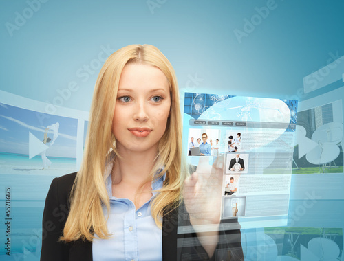 Photo: woman with virtual screen and news woman with virtual screen and news