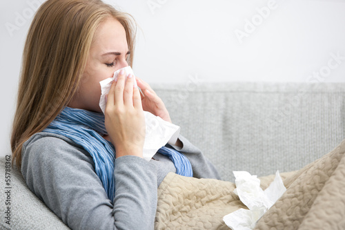 Photo: sneezing woman sneezing woman