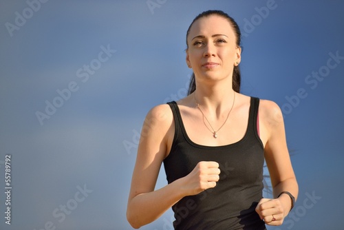 Photo: Young Woman Jogging Young Woman Jogging