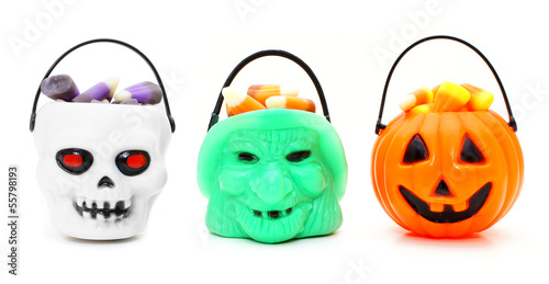 Photo: Three types of Halloween candy holders filled with candy corn Three types of Halloween candy holders filled with candy corn