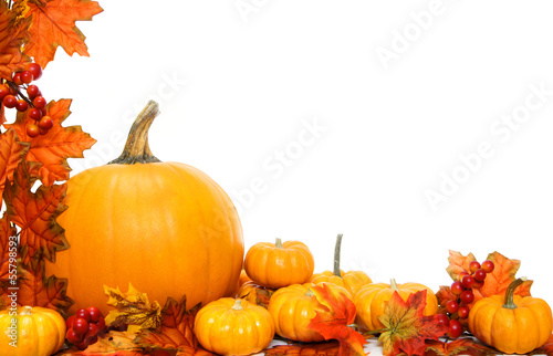 Photo: Autumn corner border or frame with leaves and pumpkins Autumn corner border or frame with leaves and pumpkins