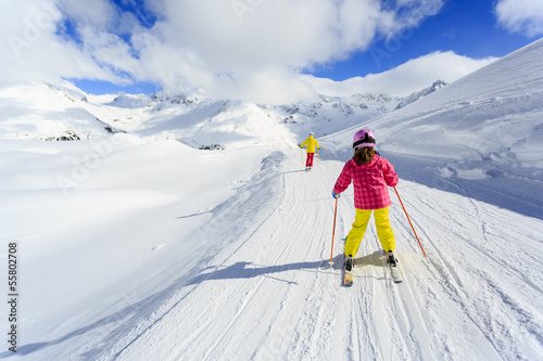 Photo: Skiing, winter, ski lesson - skiers on ski run Skiing, winter, ski lesson - skiers on ski run
