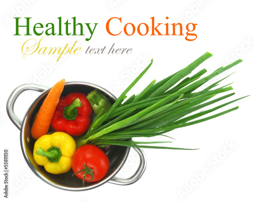 Photo: Colorful vegetables in a stainless steel cooking pot Colorful vegetables in a stainless steel cooking pot