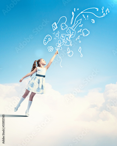 Photo: Little girl and childhood symbols Little girl and childhood symbols