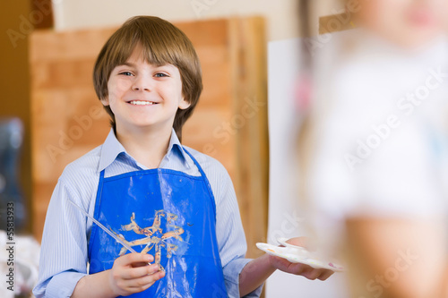 Photo: Cute boy painting Cute boy painting