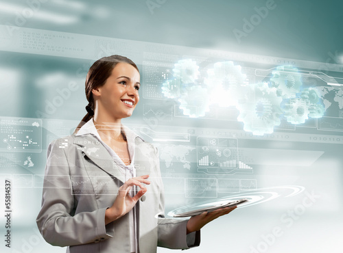 Photo: Businesswoman with tablet pc Businesswoman with tablet pc