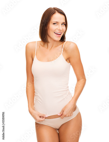 Photo: beautiful woman in beige cotton underwear beautiful woman in beige cotton underwear