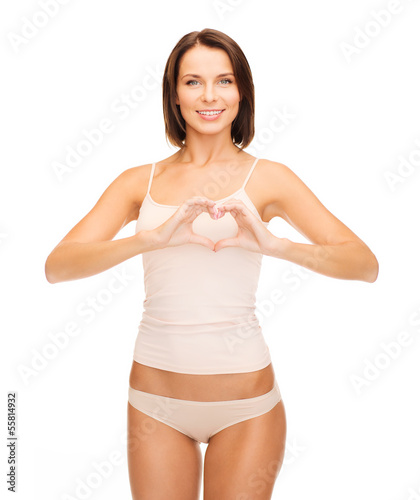 Photo: woman forming heart shape woman forming heart shape