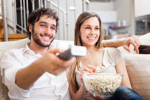 Photo: Couple watching a movie Couple watching a movie