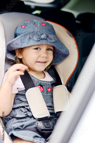 Photo: happy child in car seat happy child in car seat