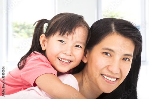 Photo: happy mother and little girl happy mother and little girl