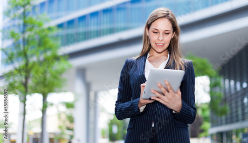 Photo: Woman using a tablet Woman using a tablet