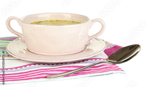 Photo: Nourishing soup with vegetables in pan isolated on white Nourishing soup with vegetables in pan isolated on white