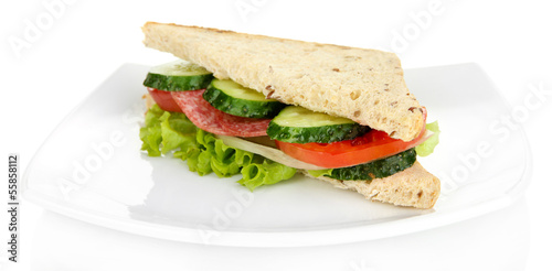 Photo: Tasty sandwich with salami sausage and vegetables Tasty sandwich with salami sausage and vegetables