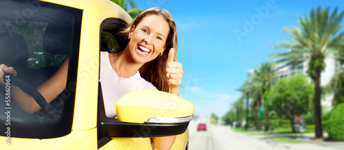 Photo: Woman car driver. Woman car driver.