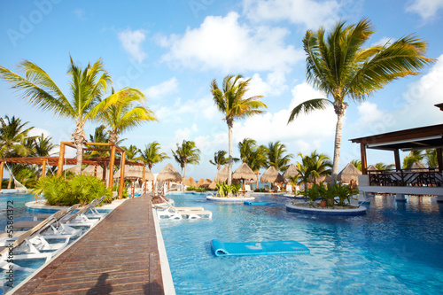 Photo: Swimming pool at caribbean resort. Swimming pool at caribbean resort.