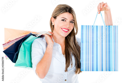 Photo: Woman holding a shopping bag Woman holding a shopping bag