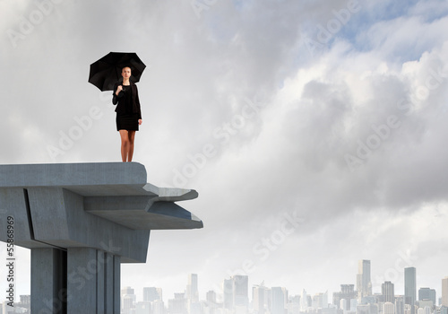 Photo: Businesswoman on bridge Businesswoman on bridge