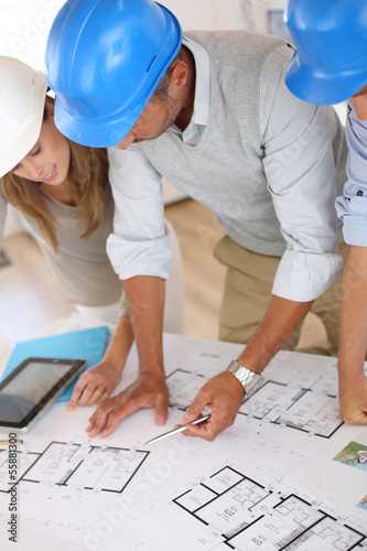 Photo: Construction people working on project Construction people working on project