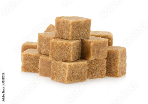 Photo: brown sugar cubes on white brown sugar cubes on white