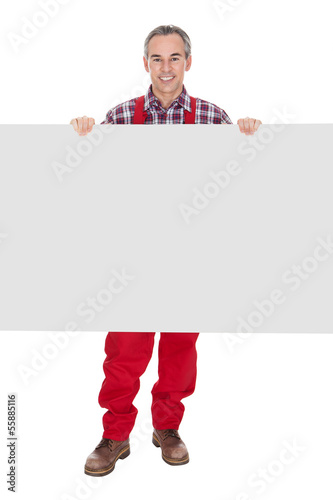 Photo: Technician Holding Blank Placard Technician Holding Blank Placard
