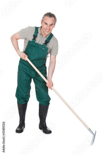 Photo: Male Gardner With Gardening ToolВ Male Gardner With Gardening ToolВ