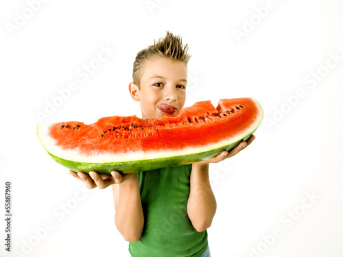 Photo: punk boy eating a big slice of watermelon punk boy eating a big slice of watermelon