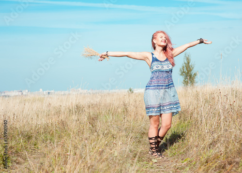 Photo: Happy beautiful woman outdoor Happy beautiful woman outdoor