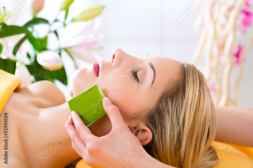 Photo: Wellness - woman having aloe vera application Wellness - woman having aloe vera application