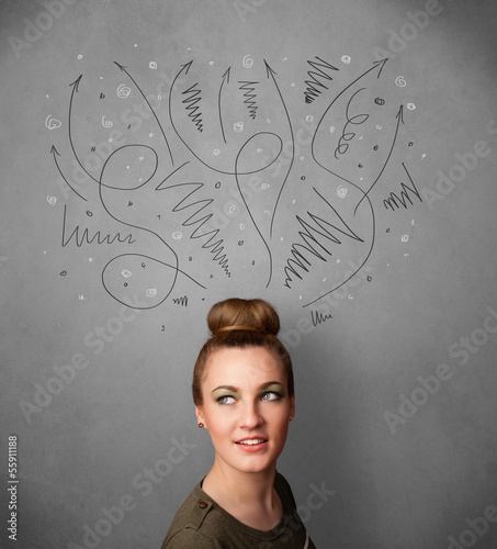 Photo: Young woman thinking with arrows over her head Young woman thinking with arrows over her head