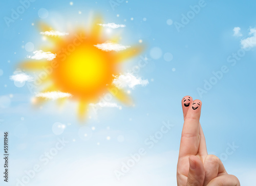 Photo: Cheerful finger smileys with bright sun and clouds illustration Cheerful finger smileys with bright sun and clouds illustration
