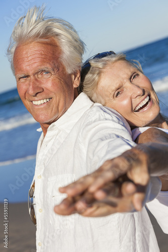 Photo: Happy Senior Old Couple on Tropical Beach Happy Senior Old Couple on Tropical Beach