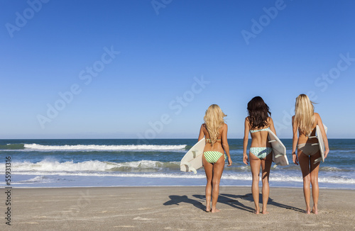 Photo: Three Beautiful Women Surfers In Bikinis With Surfboards At Beac Three Beautiful Women Surfers In Bikinis With Surfboards At Beac