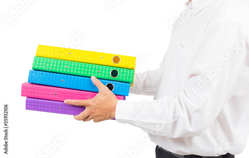 Photo: business man holding stack of folder business man holding stack of folder
