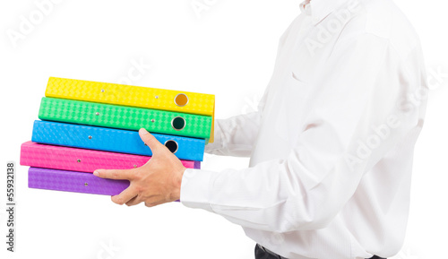 Photo: business man holding stack of folder business man holding stack of folder
