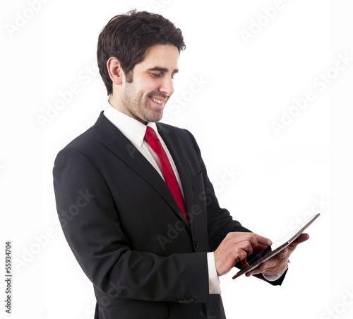 Photo: Handsome smiling businessman with tablet computer. Isolated over Handsome smiling businessman with tablet computer. Isolated over
