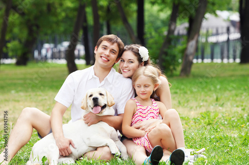 Photo: Happy family having fun outdoors Happy family having fun outdoors
