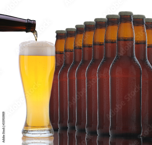 Photo: Beer Bottles With Glass Being Poured Beer Bottles With Glass Being Poured