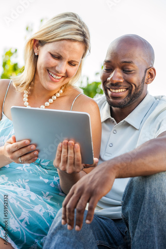 Photo: Couple with Tablet PC Couple with Tablet PC