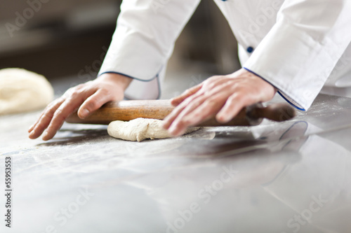 Photo: Chef prepairing dough in the kitchen Chef prepairing dough in the kitchen