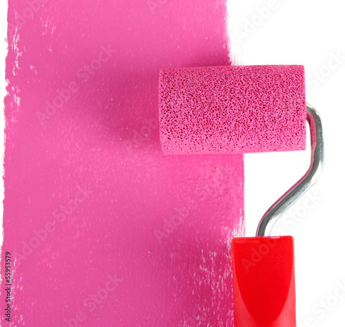 Photo: Roller brush with pink paint Roller brush with pink paint