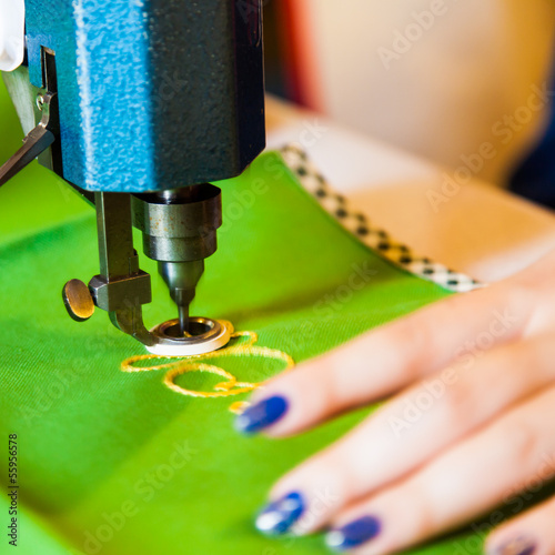 Photo: Lady hand at sewing Lady hand at sewing
