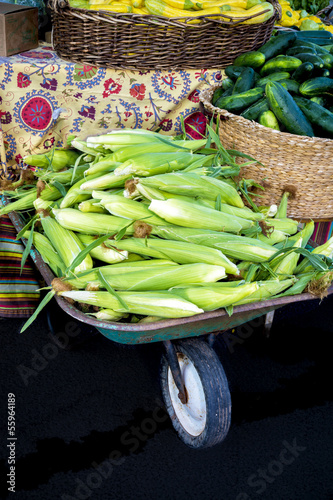 Photo: Wheel Barrel filled with fresh sweet corn Wheel Barrel filled with fresh sweet corn
