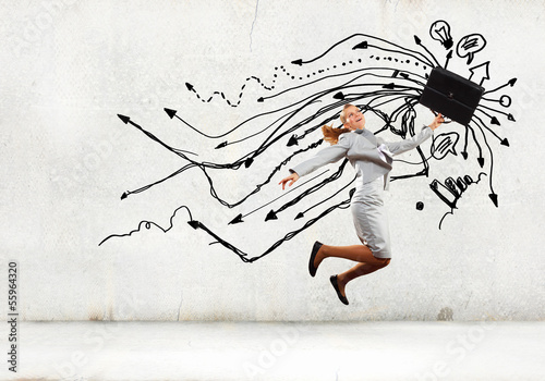 Photo: Jumping businesswoman Jumping businesswoman