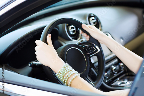 Photo: Woman in car Woman in car