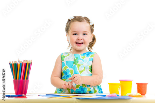 Photo: child girl drawing and making by hands child girl drawing and making by hands