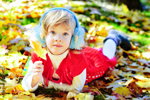 Photo: little girl meeting autumn little girl meeting autumn